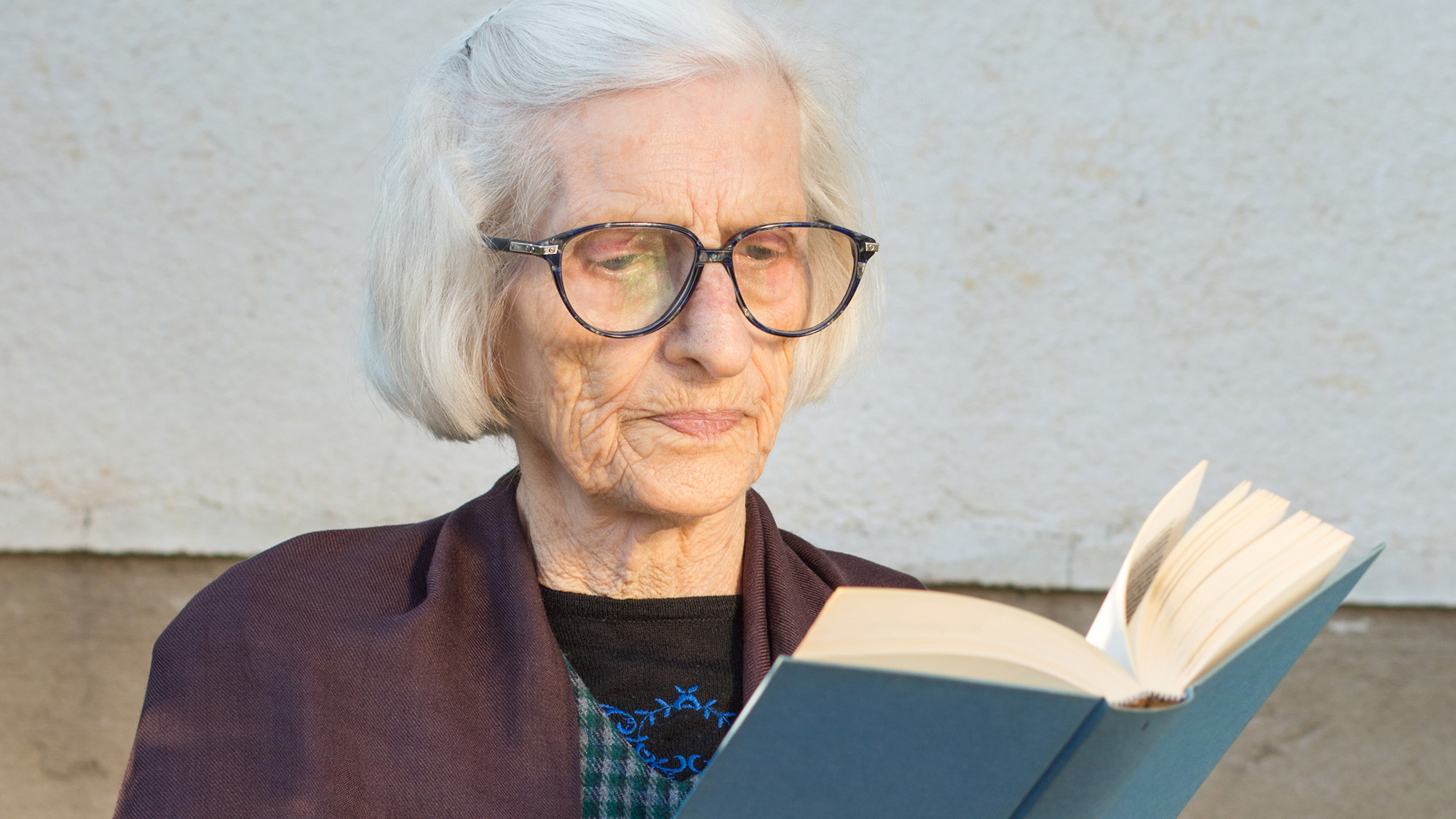 older woman reading