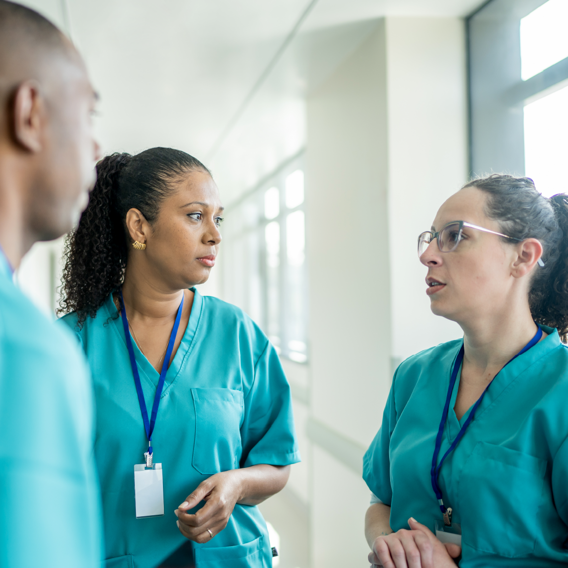 a group of nurses talking